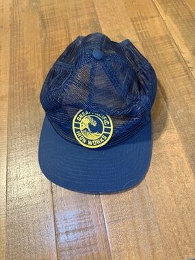 Patagonia Navy Blue Mesh Trucker Hat with Yellow Patch